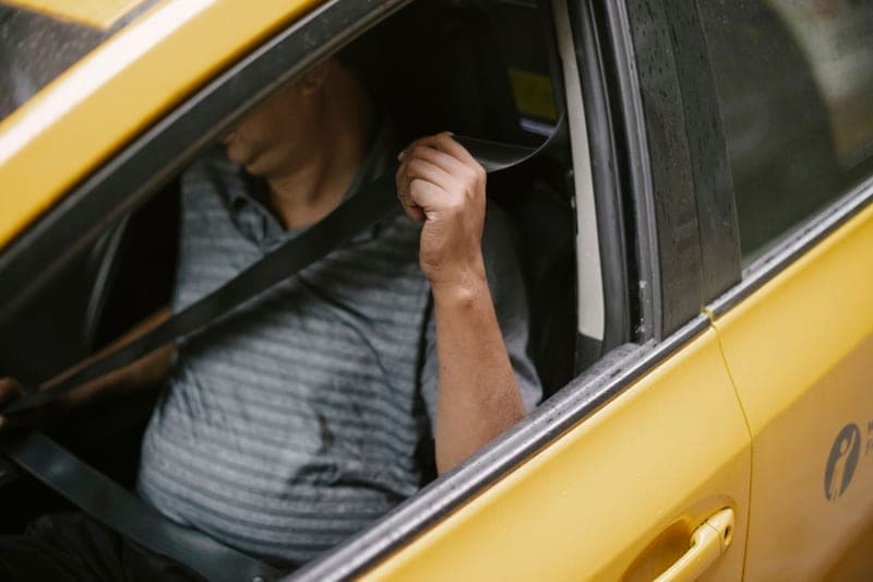A child buckled into a vehicle seat belt — category photo, not this specific model